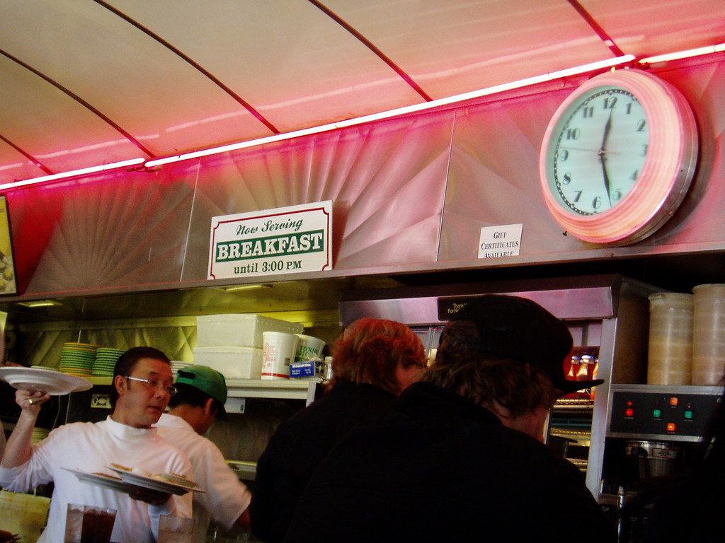 image of servers waiting on customers in a diner