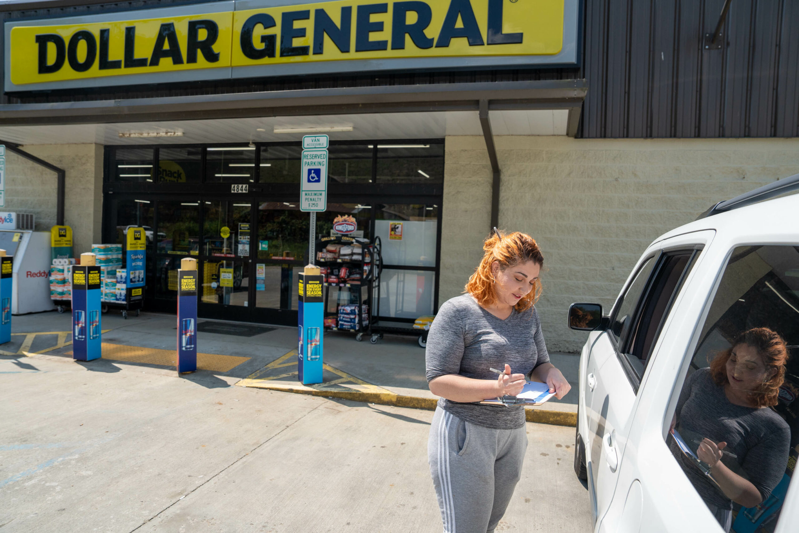 Moriah Cox canvassing outside a Dollar General in Watauga County